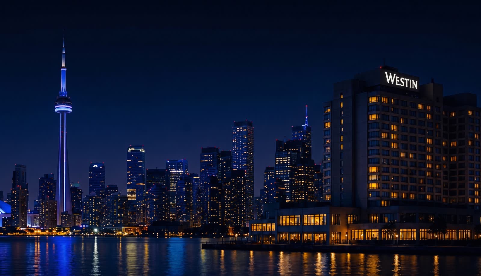 The Westin Harbour Castle and the Toronto skyline at night from Lake Ontario